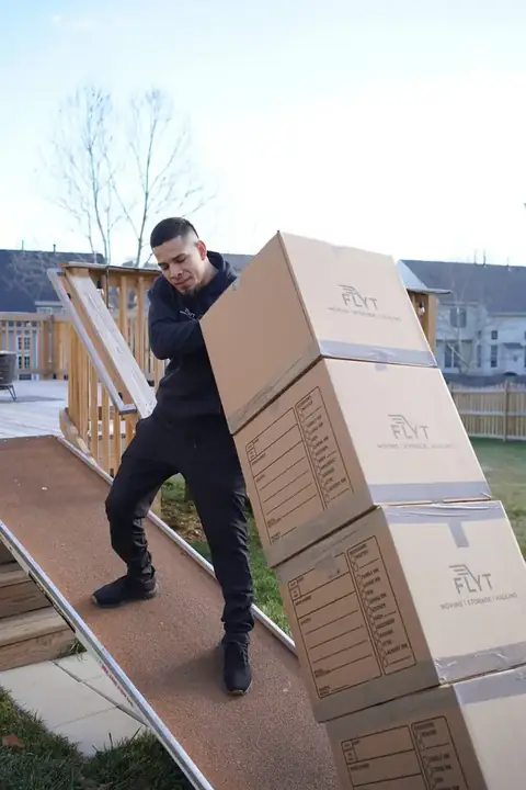 FLYT Moving crew loading a garden apartment near Franconia-Springfield Metro in Springfield, VA